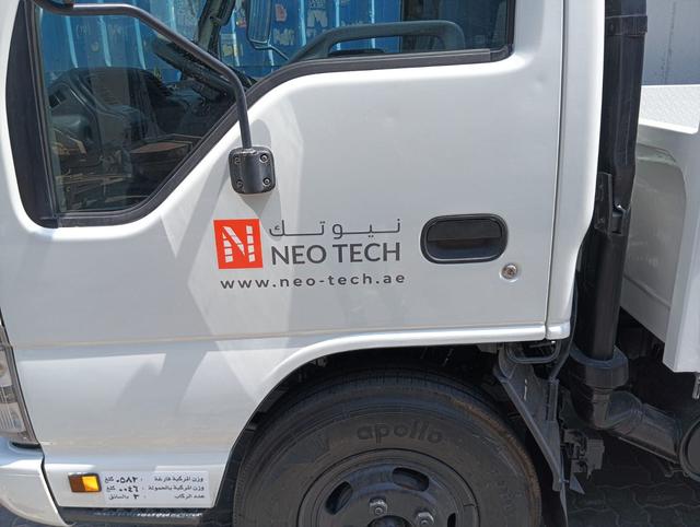 Detailed vehicle logo branding and vinyl graphics installation